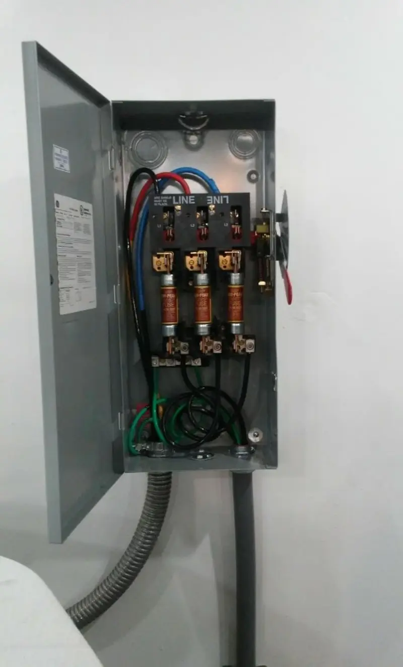 Three-phase disconnect switch installed for Smoke Detector Installation in Fort Pierce North